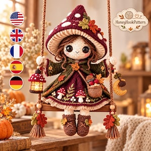 May include: A crocheted doll with brown hair wearing a large mushroom-shaped hat, a dark green cape, and a burgundy dress adorned with small mushroom and leaf motifs. The doll sits on a wooden swing, holding a lantern and a small basket.