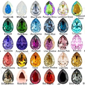 May include: A chart of 36 pear-shaped crystal colors, including Crystal, Crystal AB, White Opal, Blue Shade, Paradise Shine, Luminous Green, Iridescent Green, Olivine, Fern Green, Emerald, Dark Moss, Aquamarine, Denim Blue, Montana, Turquoise, Provence Lavender, Smoky Mauve, Tanzanite, Purple Velvet, Amethyst, Lilac Shadow, Antique Pink, Rosaline, Rose/Fuchsia, Rose Peach, Padparadscha, Sunflower, Topaz, Golden Shadow, Light Silk, Lt Colorado, Astral Pink, Silver Shade, Greige Brown, Rose Gold, Siam, Red Magma, Jet, Silver Night, and Black Diamond.