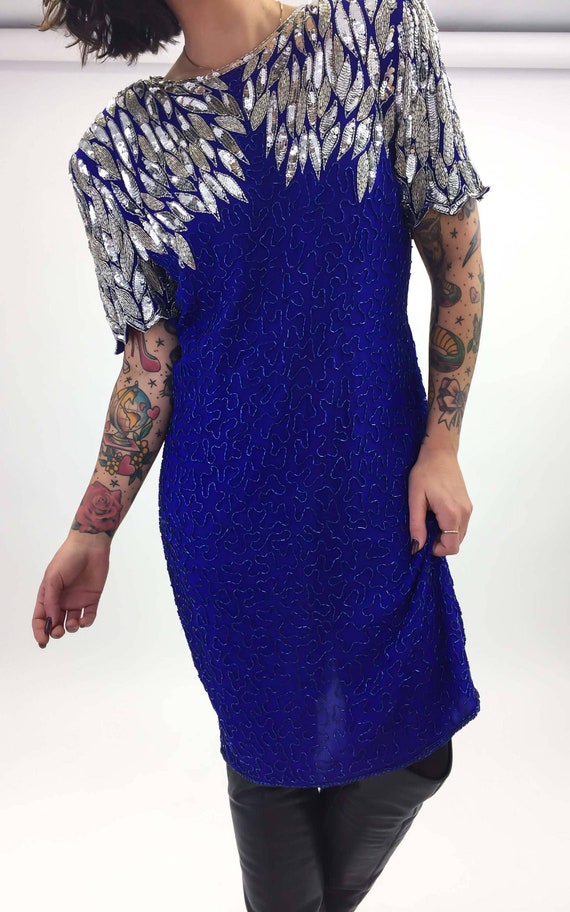 silver and blue sequin dress