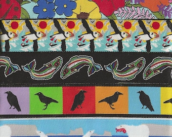 May include: A collection of patterned ribbons featuring various designs. The ribbons display images of flowers, puffins, fish, crows, and polar bears. The color palette includes vibrant hues of blue, red, green, and yellow, creating a visually diverse and detailed display.