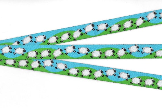 ANIMALS/Farm C-04-A Jacquard Ribbon Poly Trim 5/8" wide (16mm) Turquoise w/Green Grass, Running/Jumping Black & White Sheep