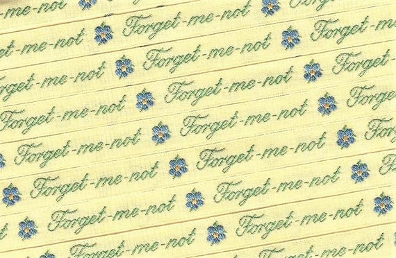 KAFKA A-03/F-33 Jacquard Ribbon Woven Organic Cotton Trim 7/16" wide (10mm) Yellow Background w/Blue Forget-Me-Nots, Green Text