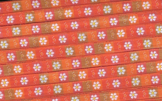 FLORAL A-95-B Jacquard Ribbon Polyester Trim 7/16" wide Shades of Orange "Blocks" Background w/White & Yellow Daisies Flowers