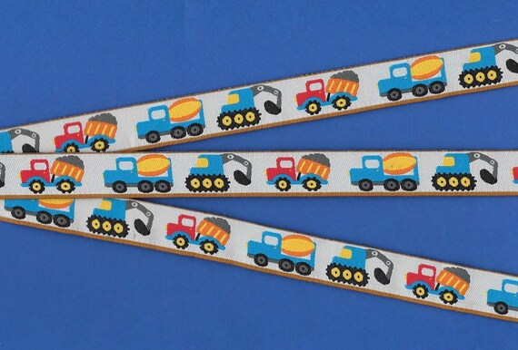 NOVELTY/VEHICLES Jacquard Ribbon Poly Trim 5/8" wide Blue Background w/Multi-Colored Dump Trucks Cement Mixers Backhoes, Per Yard