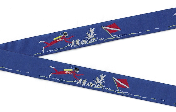 NOVELTY/SPORTS F-02-A Jacquard Ribbon Poly Trim 15/16" wide (24mm) Bright Blue Background w/Red & Yellow Scuba Diver, Coral Reef, Flags