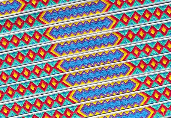 NATIVE AMERICAN  A-03-B Jacquard Ribbon Poly Trim 7/16" wide (12mm) White Background w/Red, Yellow, Blue, Purple & Aqua Diamond Design