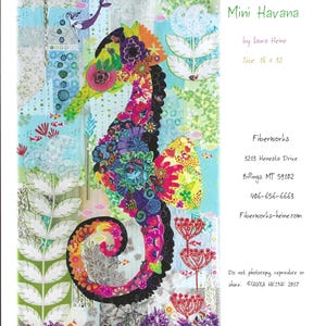 May include: A colorful fabric art piece titled "Mini Havana" featuring a seahorse design. The seahorse is adorned with floral patterns in various colors. The artwork measures 18 x 32 inches and includes the artist's and Fiberworks' information.