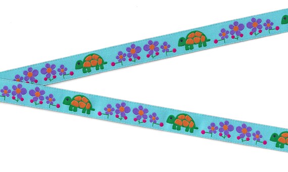 ANIMALS/Water C-12-A Jacquard Ribbon Poly Trim 5/8" wide (16mm) Blue w/Green & Orange Turtles, Purple and Orange Flowers