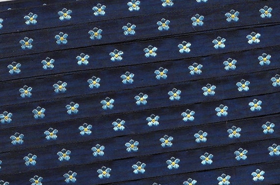 KAFKA A-03/04 Jacquard Ribbon Woven Organic Cotton Trim 7/16" wide (10mm) Navy Background w/Lt Blue & Yellow Forget-Me-Nots, Per Yard