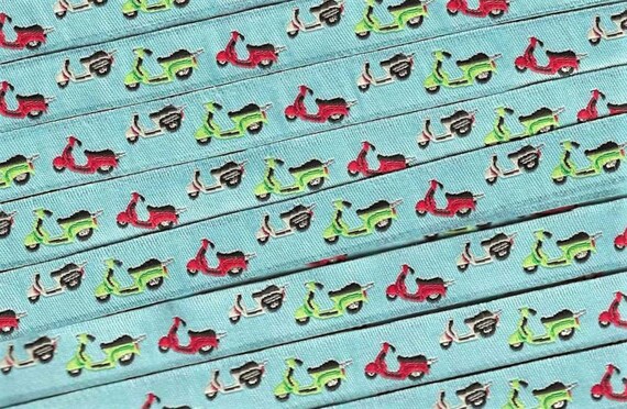 NOVELTY B-04-A Jacquard Ribbon Poly Trim 1/2" wide (13mm) Blue w/Red, Lime Green & White Mopeds/Scooters, Silver Metallic Accents