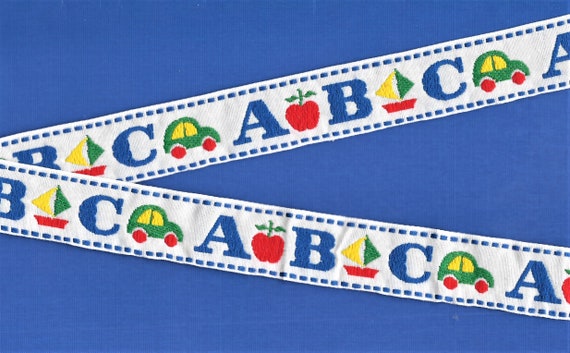 CHILDREN's F-03-C Jacquard Ribbon Cotton Trim 1" wide (25mm) White Background Large ABC Pattern in Blue, Green, Red & Yellow