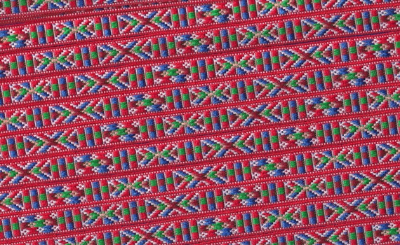 NATIVE AMERICAN B-15-B Jacquard Ribbon Poly Trim 1/2" wide (13mm) Red Background w/Blue. Green, White, Orange & Red Southwest Tribal Pattern