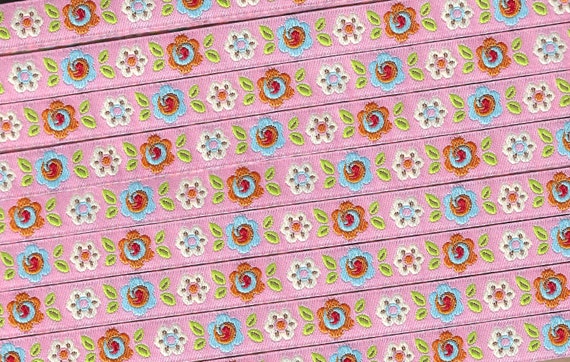 FLORAL A-90-A Jacquard Ribbon Polyester Trim 7/16" wide (12mm) DENA DESIGNS Pink Background w/Blue, Orange & White Flowers Green Leaves