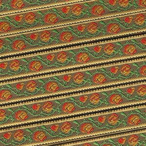 May include: Close-up of decorative ribbon with a repeating floral pattern. The ribbon features a gold border with a green and red floral design. The pattern is arranged diagonally across the image.