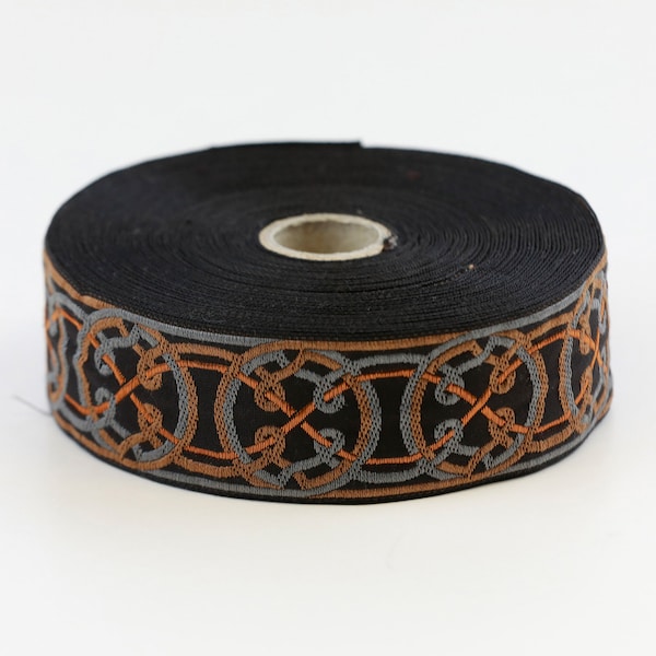 Cinta jacquard KAFKA G-11/18 de algodón orgánico, 32 mm de ancho (1-1/4"), negra con círculos celtas en gris, cobre y gris topo