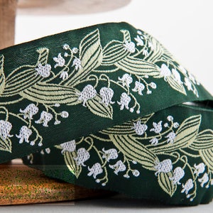 KAFKA H-02/05 Jacquard Ribbon Woven Organic Cotton Trim 1-1/2" wide (38mm) Dark Green w/White Lilies of the Valley & Lt Green Leaves.Stems