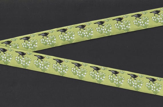 ANIMALS/Birds E-25-A Jacquard Ribbon Poly Trim 7/8" wide (22mm) Green Background w/Black Birds and White Snowdrop Flowers