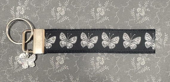 Jacquard Ribbon/Nylon Web 1" wide (25mm) Key Fobs, Silver Metallic Butterflies w/Charms, Keychain, Key Wristlet, Luggage Tags, 5.5" long
