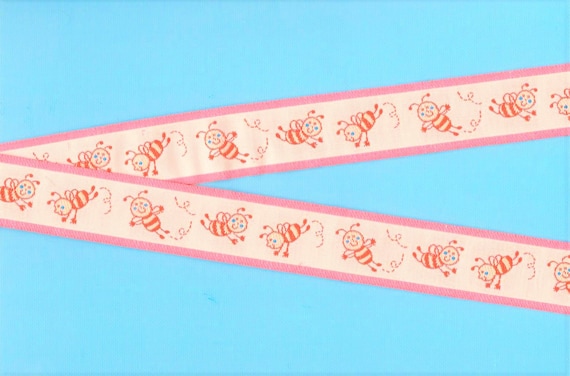 INSECTS F-01-A Jacquard Ribbon Poly Trim 1" wide (25mm) Made in Spain, "Bee Happy!" Flying Red Striped Bees on Pink Background REMNANTS