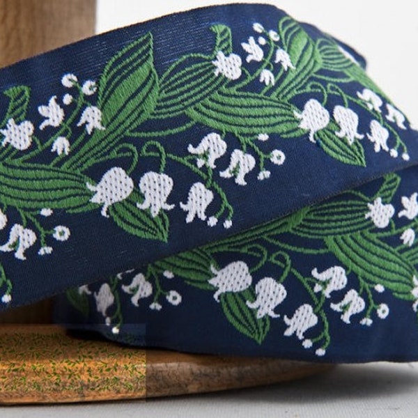 KAFKA H-02/04 Jacquard Ribbon Woven Organic Cotton Trim 1-1/2" wide (38mm) Navy Background w/White Lilies of the Valley, Green Leaves/Stems