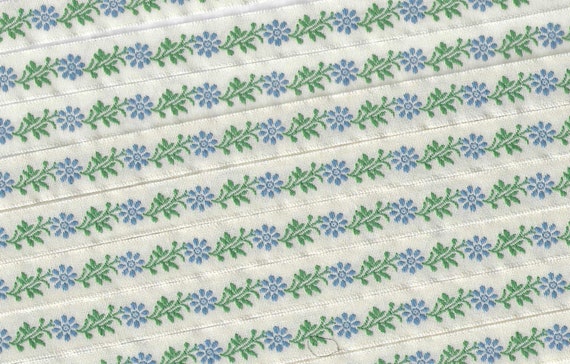 KAFKA A-02/08 Jacquard Ribbon Woven Organic Cotton Trim 7/16" wide (10mm) Ivory Background w/Sky Blue Flowers, Green Leaves