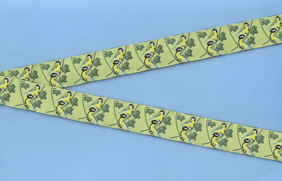 ANIMALS/Birds E-24-A Jacquard Ribbon Poly Trim 7/8" wide (22mm) Peridot Green Background w/a Pair of Blue & Yellow Birds on Branches