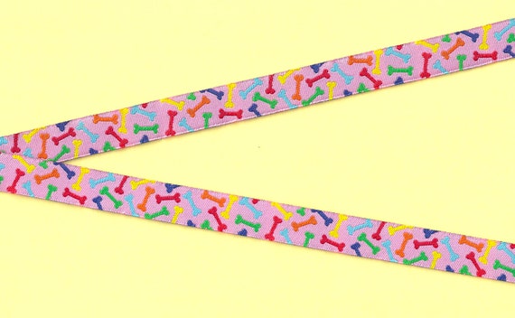 NOVELTY/Dogs C-01-C Jacquard Ribbon Polyester Trim 5/8" wide (16mm) Pink Background w/Bright, Multi-Colored Dog Bones