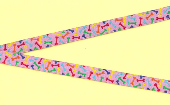 NOVELTY/Dogs C-01-C Jacquard Ribbon Polyester Trim 5/8" wide (16mm) Pink Background w/Bright, Multi-Colored Dog Bones, Per Yard