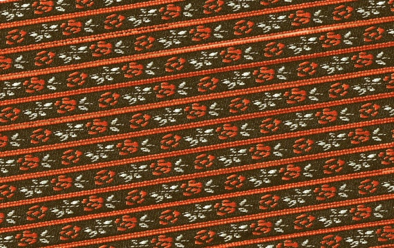 FLORAL A-11-i Jacquard Ribbon Polyester Trim 5/16" wide, Black Background, Orange Flowers, White Leaves and Stems