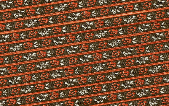 FLORAL A-11-i Jacquard Ribbon Polyester Trim 5/16" wide, Black Background, Orange Flowers, White Leaves and Stems