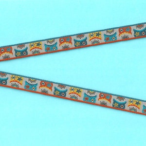 ANIMAIS/Pássaros B-04-A Fita Jacquard Poliéster 1/2" de largura (13 mm) FARBENMIX Fabricado na Alemanha, rostos de coruja multicoloridos em cinza