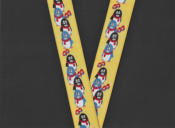 ANIMALS/Water G-01-A Jacquard Ribbon Poly Trim, 1-1/4" Wide (32mm) Yellow Background w/Penguins wearing Red Scarves