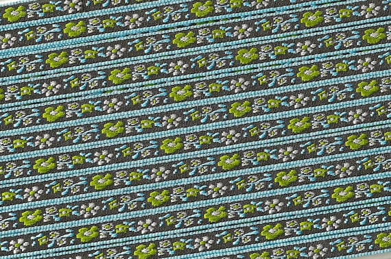 FLORAL A-14-G Jacquard Ribbon Poly Trim 5/16" wide, Black Background w/Blue Border, Green & White Flowers, Blue Leaves