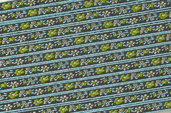 FLORAL A-14-G Jacquard Ribbon Poly Trim 5/16" wide, Black Background w/Blue Border, Green & White Flowers, Blue Leaves