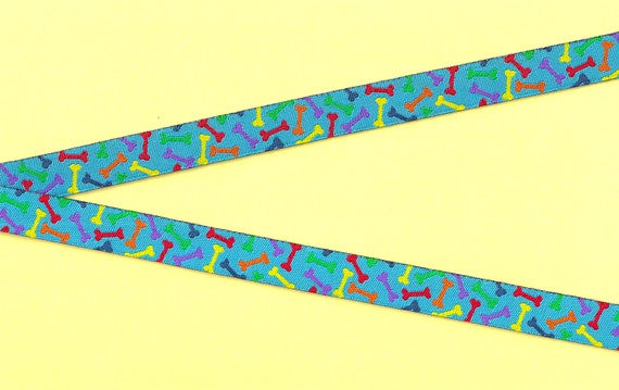 NOVELTY/Dogs C-01-B Jacquard Ribbon Polyester Trim 5/8" wide (16mm) Turquoise Background w/Bright, Multi-Colored Dog Bones, Per Yard