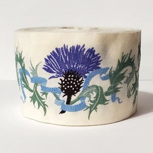KAFKA K-01/01 Jacquard Ribbon Woven Organic Cotton Trim 2&quot; wide (50mm) Ivory w/Purple Thistles, Blue Ribbons & 2-Tone Green Leaves