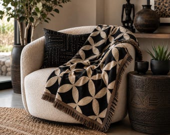 Couverture tissée à motifs géométriques de cercles entrelacés | Motif moderne noir et crème