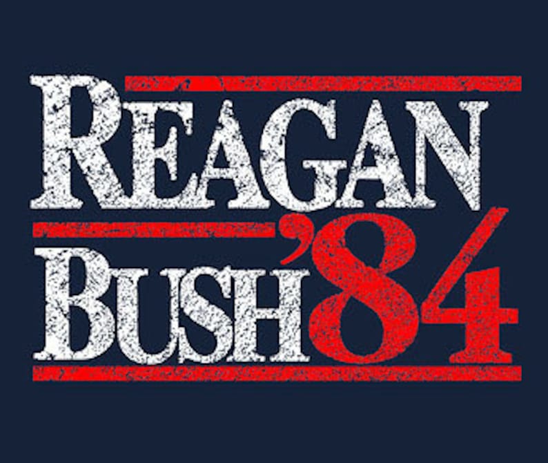 May include: A vintage-style political campaign poster with the text "Reagan '84 Bush" in red and white lettering on a dark blue background.