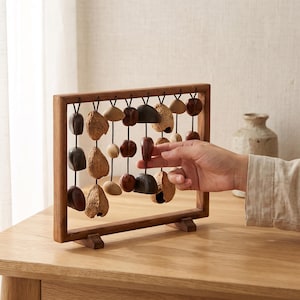 Natural Pangi Nut Shell Chime, Wooden Seed Pod Sound Sculpture, Rustic Tabletop Decor