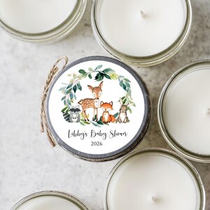 Example of custom label for woodland baby shower candle favor with name and date personalization