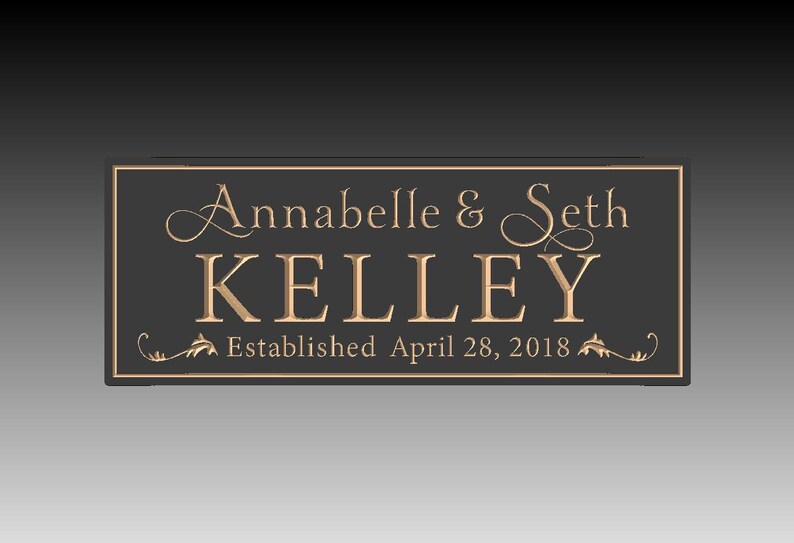 Puede incluir: Placa rectangular con los nombres "Annabelle & Seth Kelley" en escritura elegante y letras de bloque. Tambi&eacute;n se incluye el texto "Established April 28, 2018". La placa tiene un fondo gris oscuro con letras y borde dorados.