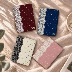 May include: Four rectangular compact mirrors featuring polka dot patterns and lace accents. The mirrors come in burgundy, navy blue, cream, and dusty pink, each with gold-colored initials printed in the bottom corner: FD, EA, YU, and RV.