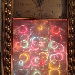 Retro 80s Lighted Quartz Wall Clock - Gold Rope Frame Motion Illusion Clock - Vintage Kaleidoscope Optical Illusion Light Up Clock