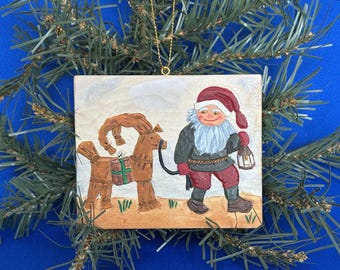 Christmas Tree Ornament depicting a Swedish Tomte Leading a Yule Goat or Yulbock in Swedish