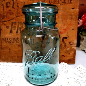 One Vintage CHIPPED Aqua Blue Ball Ideal Quart Sized Jar with MISMATCHED LIGHT Aqua Glass Lid and Wire Bail Light Patchy Haze