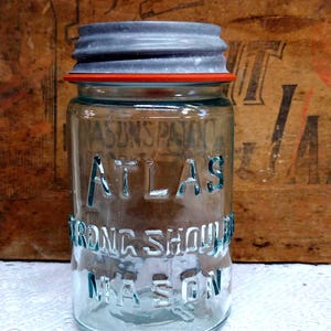 One Vintage IMPERFECT Pint Sized Aqua Colored Atlas Strong Shoulder Mason Jar with Rustic Atlas Brand Regular or Standard Mouth Zinc Lid