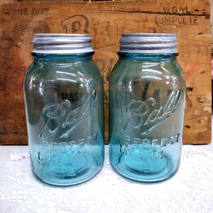 Two Aqua Blue IMPERFECT Quart Sized Ball Perfect Mason Jars with Offset Embossing Zinc Lids CHIPS to LIPS and Bead Seals
