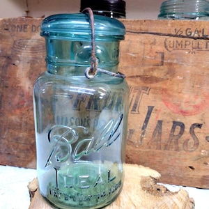 One Vintage Aqua Blue Ball Ideal Jar Quart Sized SCRATCH and DENT Jar with Wire Bail and Scratch and Dent Blue Glass Lid Patchy Haze to Base