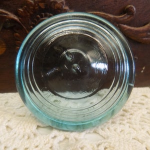 One Vintage SLIGHTLY IMPERFECT Aqua Blue STANDARD Mouth Glass Lid for Regular Mouth Wire Bail Jars Unusual Shape May have Lines in the Glass