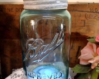 One Antique IMPERFECT aqua blue Ball Improved quart jar with improved style band and aqua glass insert Lip is ROUGH Please read description